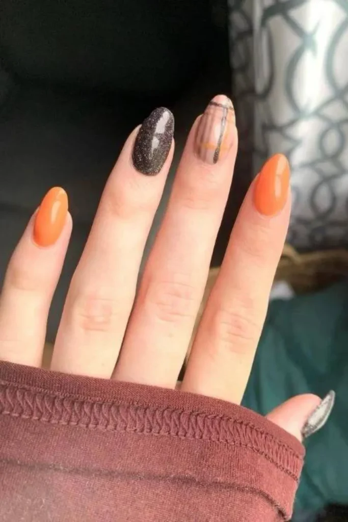 Orange and Glitter Duo Nails